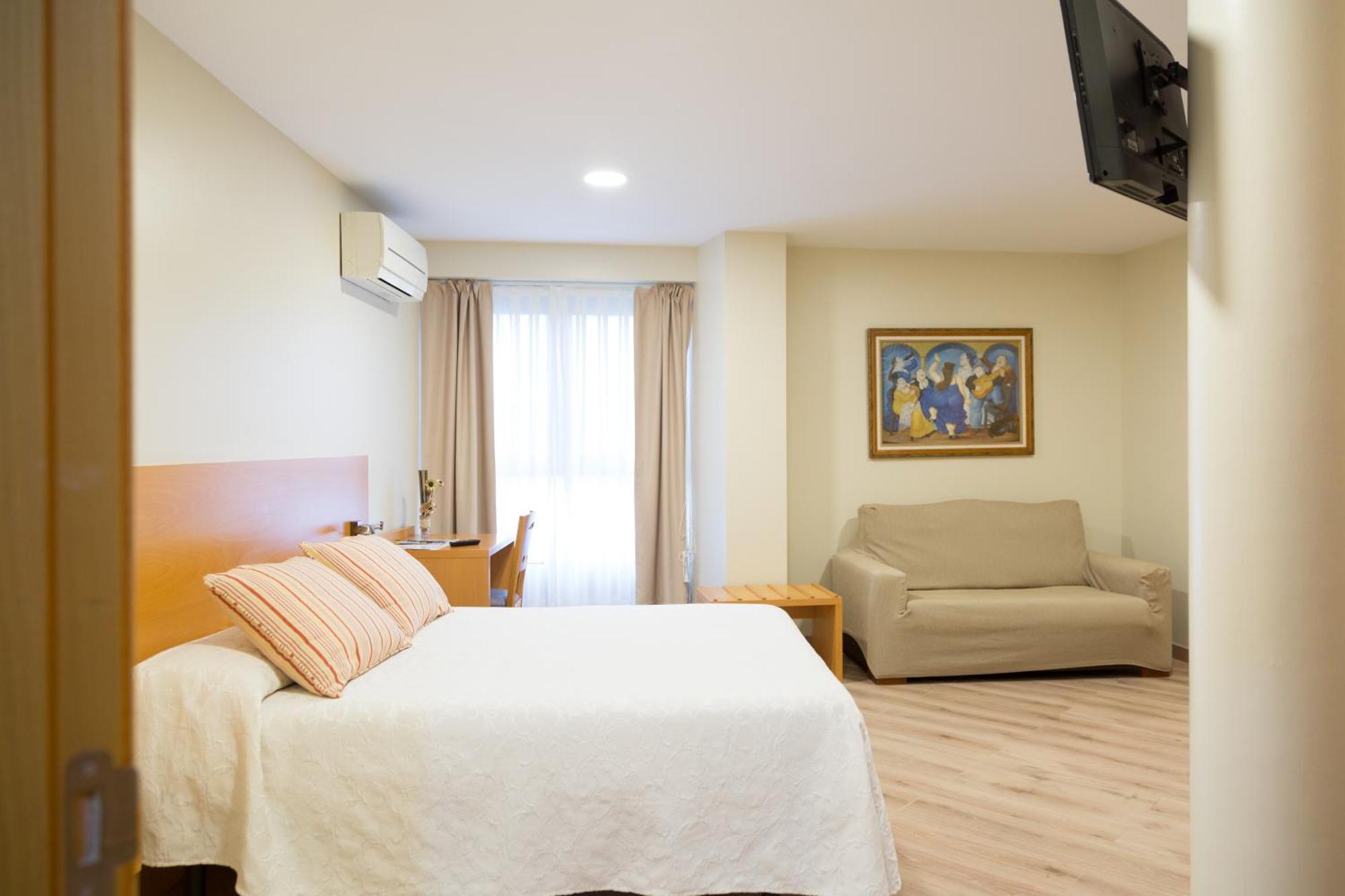 Apartamentos Playa De Cóbreces Eksteriør bilde
