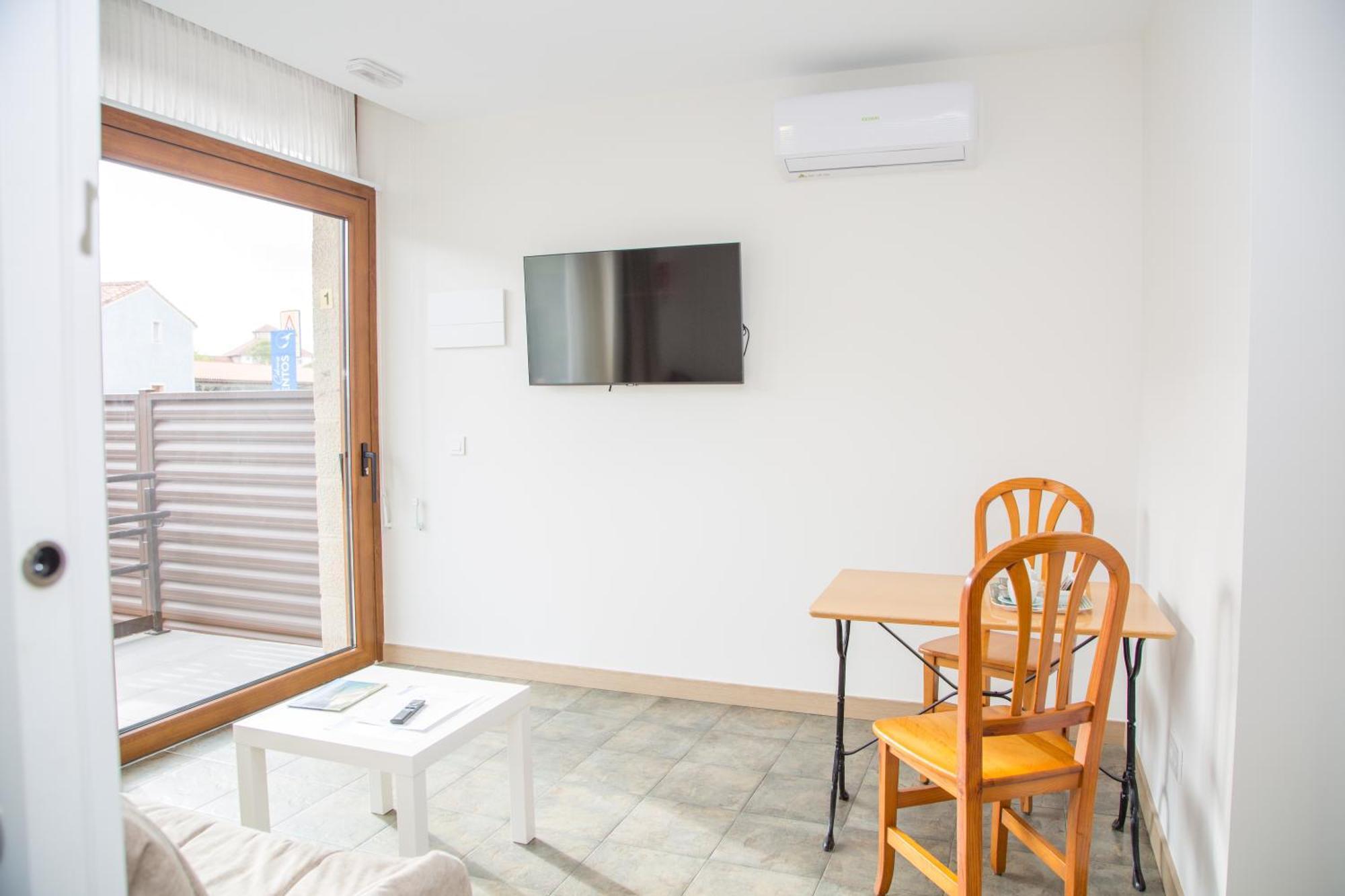 Apartamentos Playa De Cóbreces Eksteriør bilde
